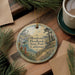A round ornament with a scenic landscape of Mendocino Headlands State Park, California, featuring a lighthouse and a path leading through the wooded area.