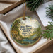 A round ornament with a scenic landscape of a river and trees, featuring the text "Mike Roess Gold Head Branch State Park, Florida" on it.