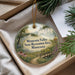 A Minnesota Valley State Recreation Area ornament is displayed in a box, surrounded by pine branches and greenery.