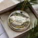 A decorative ornament with a scenic landscape of Mount Diablo State Park, California, featuring a deer, pine trees, and mountains.