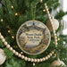 A round ornament hanging on a Christmas tree, featuring a scenic image of Mount Diablo State Park, California.