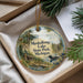 A round ornament with a scenic image of Muskallon Lake State Park, Michigan, hanging from a string.
