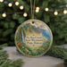 A circular ornament with a scenic image of the Na Pali Coast State Wilderness Park in Hawaii, featuring a waterfall and lush vegetation.