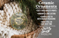 Ceramic ornaments, including a decorative piece with a scenic view of Napoo State Park, Illinois, hanging from a wicker basket.