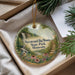 A decorative ornament with a scenic landscape of Nerstrand-Big Woods State Park, Minnesota, featuring a waterfall, pine trees, and colorful flowers.