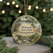 A round ornament with a scenic landscape of Nickerson State Park, Massachusetts, featuring a castle, trees, and a stream.