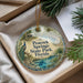 A decorative ornament with a peacock and a scenic landscape, featuring the text "Peacock Springs State Park, Florida".