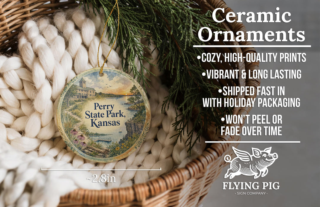 Ceramic ornaments, featuring a round ornament with a scenic view of Perry State Park, Kansas, hanging from a wicker basket.