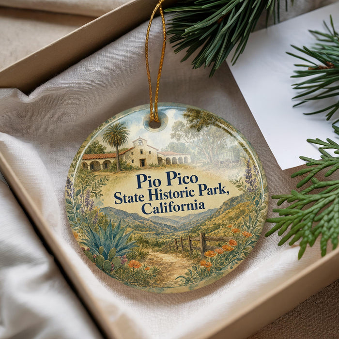 A decorative ornament with a scenic image of Pio Pico State Historic Park, California, hanging from a string.