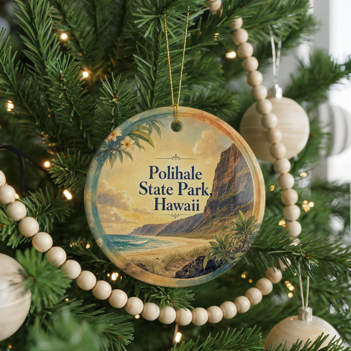 A round ornament on a Christmas tree, featuring a scenic image of Polihale State Park in Hawaii.