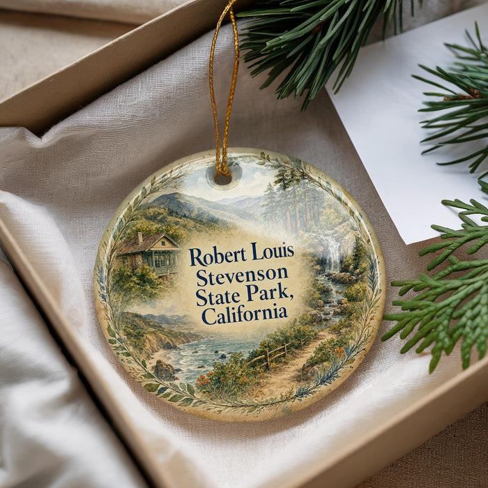 A decorative ornament with a scenic landscape of Robert Louis Stevenson State Park, California, hanging from a string.