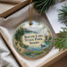 A round ornament with a scenic landscape of Round Lake State Park, Idaho, featuring a lake, mountains, and pine trees.