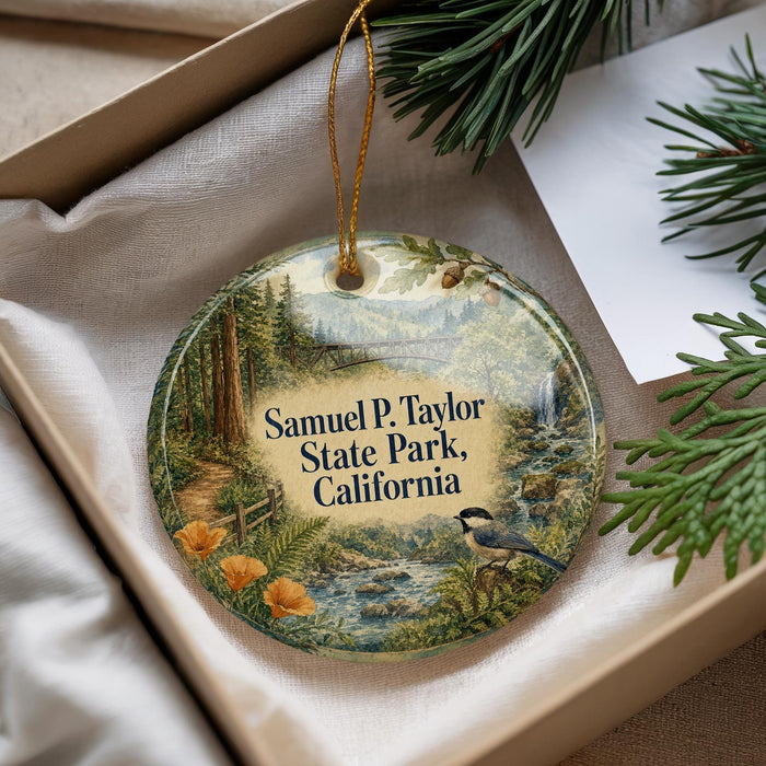 A decorative ornament with a scenic landscape of Samuel P. Taylor State Park, California, featuring a bird, a path, and a river.