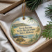 A round ornament with a beach scene and palm trees, featuring the text "Sand Island State Recreation Area, Hawaii" on it.