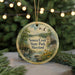A round ornament with a scenic image of Seneca Creek State Park, Maryland, featuring a bird, a bridge, and a river.