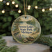 A circular ornament featuring a scenic landscape of Seven Lakes State Park, Michigan, with a bridge and pine trees in the background.