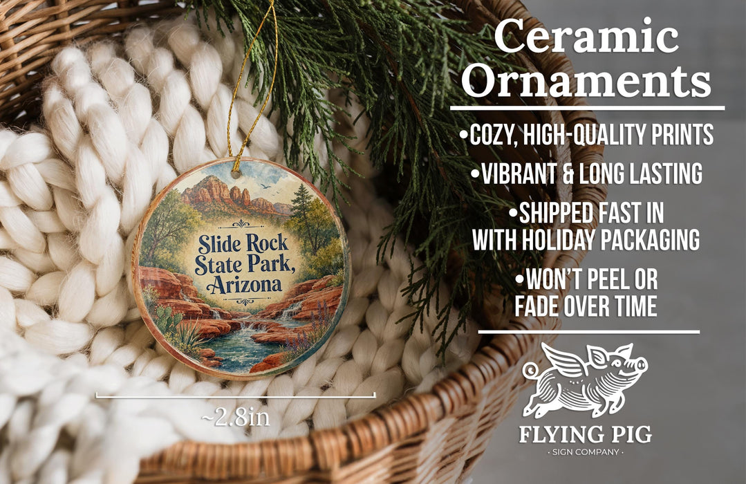 Ceramic ornaments, featuring a detailed illustration of a scenic landscape with a waterfall, are displayed in a woven basket.