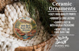Ceramic ornaments, featuring a detailed illustration of a scenic landscape with a waterfall, are displayed in a woven basket.