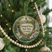 A round ornament hanging on a Christmas tree, featuring a scenic image of Smithall Woods State Park in Georgia.