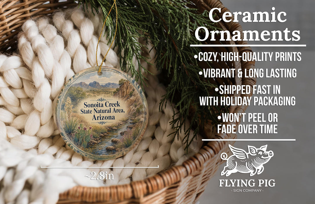Ceramic ornaments, featuring a detailed image of Sonota Creek State Natural Area, Arizona, hanging from a wicker basket.