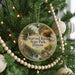 A round ornament hanging on a Christmas tree, featuring a scenic image of the Starved Rock State Park in Illinois.