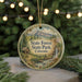 A round ornament with a scenic image of State Forest State Park, Colorado, hanging from a string.