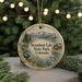 A round ornament with a scenic image of Steamboat Lake, State Park, and Colorado, featuring a moose, pine trees, and a lake with a mountain backdrop.
