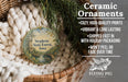 Ceramic ornaments, featuring a painting of a forest scene with a river, are displayed in a basket.