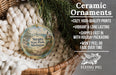 Ceramic ornaments, featuring a scenic image of Straits State Park, Michigan, hanging from a wicker basket.