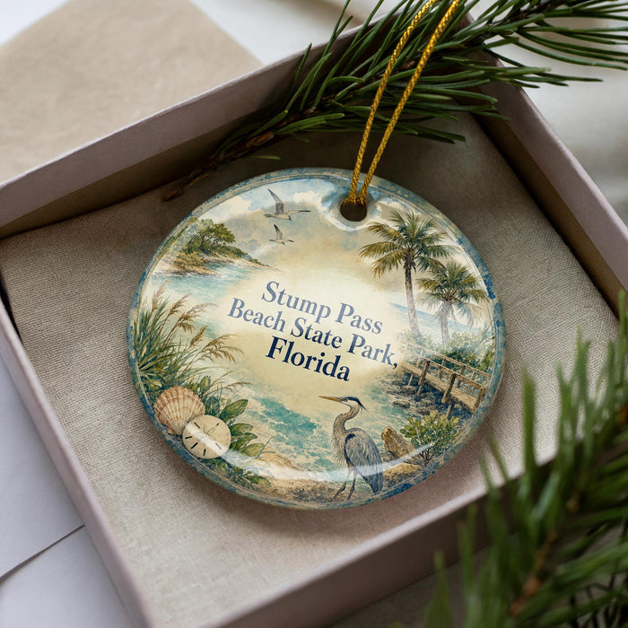 A decorative ornament with a beach scene and palm trees, featuring the text "Stump Pass Beach State Park, Florida" on it.