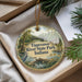 A decorative ornament with a scenic image of Tippecanoe River State Park, Indiana, hanging from a string.