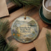 A decorative ornament featuring a scenic image of Tomales Bay State Park, California, with a bird and a body of water in the background.