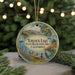 A round ornament with a scenic image of Turlock Lake, the State Recreation Area in California, featuring a boat, dock, and a bird.
