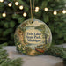 A round ornament with a scenic landscape of Twin Lakes State Park, Michigan, featuring a lake, forest, and boat on the water.