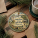 A decorative ornament featuring illustrations of Upper Sioux State Park, Minnesota, with a pine tree and other natural elements.