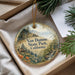 A decorative ornament with a scenic landscape of Van Damme State Park, California, featuring a cabin and pine trees.