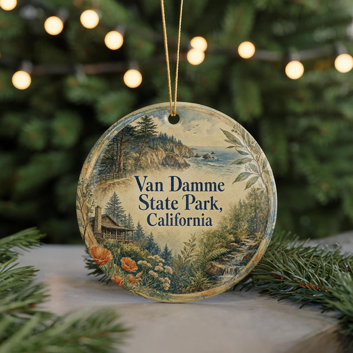 A round ornament with a scenic landscape of Van Damme State Park, California, featuring a forest, mountains, and a lake.