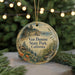 A round ornament with a scenic landscape of Van Damme State Park, California, featuring a forest, mountains, and a lake.