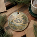 A decorative ornament featuring a scenic landscape of Vega State Park, Colorado, with a mountain, lake, and forest in the background.