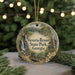 A round ornament with a scenic image of Victoria Falls and Victoria State Park in Georgia, surrounded by greenery and twinkling lights.