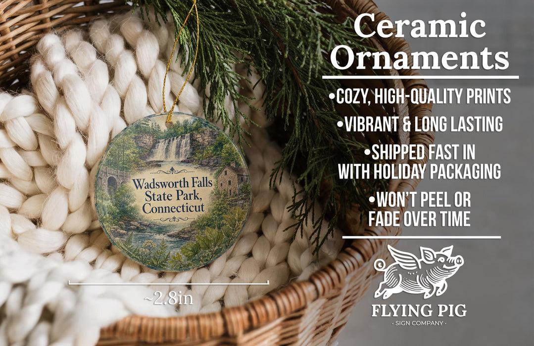 Ceramic ornaments, featuring a scenic image of Wadsworth Falls State Park, Connecticut, hanging from a wicker basket.