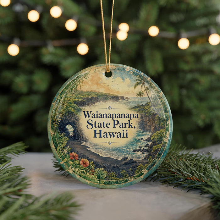 A circular ornament with a scenic image of Waianapapa State Park, Hawaii, featuring a tropical landscape with palm trees, a beach, and a waterfall.