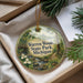 A decorative ornament with a scenic image of Warren Woods State Park, Michigan, hanging from a string.