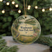 A round ornament with a scenic landscape of Waubonsie State Park, Iowa, featuring a bird, a bridge, and a river.
