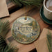 A decorative ornament featuring a scenic image of Wild River State Park in Minnesota, with pine branches and a cup of coffee nearby.