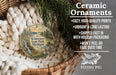 Ceramic ornaments, featuring a nature scene with a deer and a forest, are displayed in a woven basket.