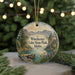 A decorative ornament featuring a scenic landscape of Winchester Lake State Park in Idaho, with a boat on the lake and mountains in the background.