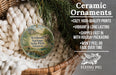 Ceramic ornaments, featuring a scenic image of Withow Springs State Park, Arkansas, hanging in a woven basket.