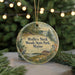 A round ornament with a scenic image of Wolf's Neck Woods State Park, Maine, hanging from a string.