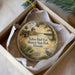 A decorative ornament in a box, featuring a painting of a historical fort and a bird, with the text "Yellow Bluff Fort Historic State Park, Florida" printed on it.